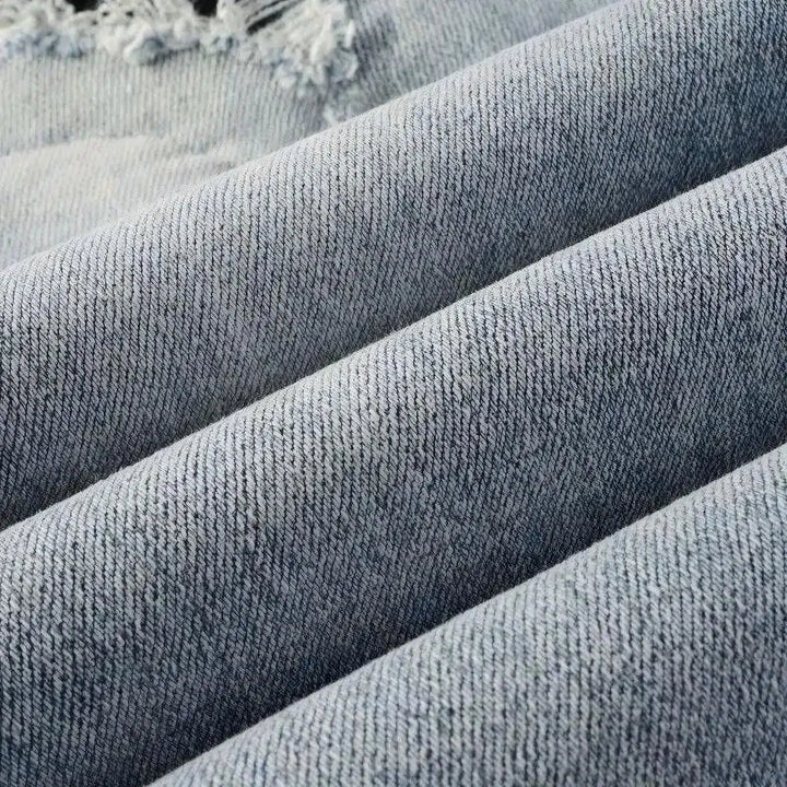 Black-patch whiskered jeans