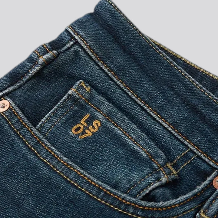 Mid-waist dark sanded men's jeans