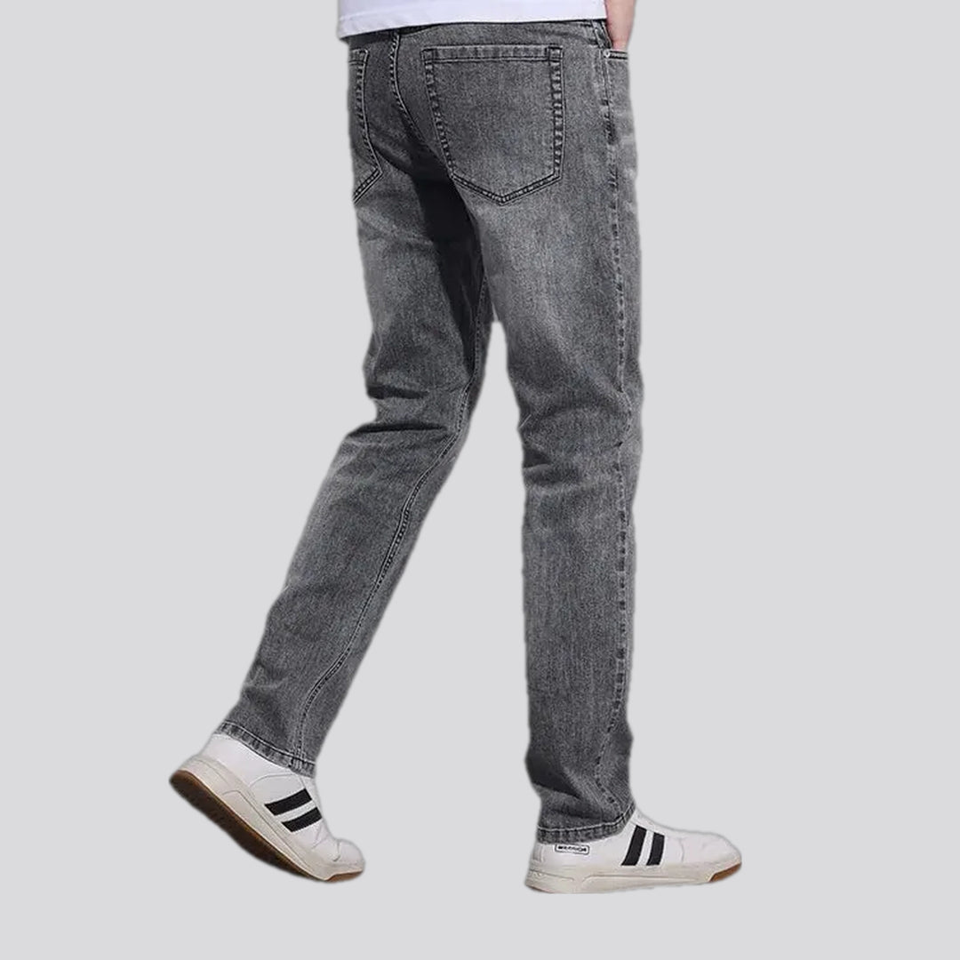 Abraded stonewashed slim men's jeans