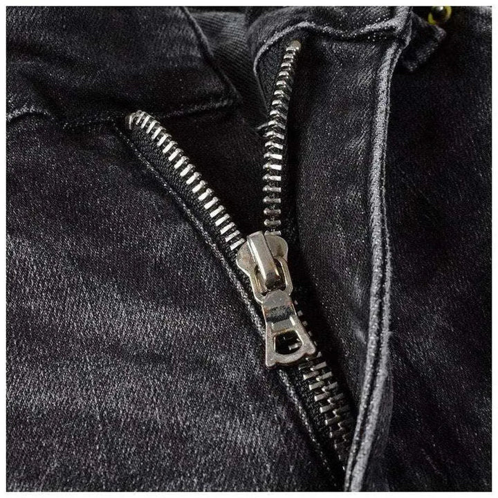 Distressed knees painted men's jeans